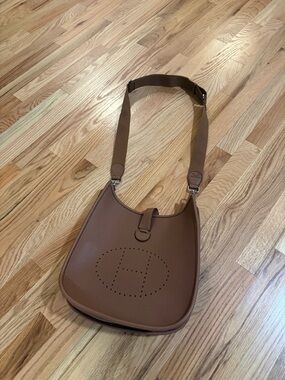Evelyne inspired Brown Leather Crossbody Bag with Perforated Logo Detail